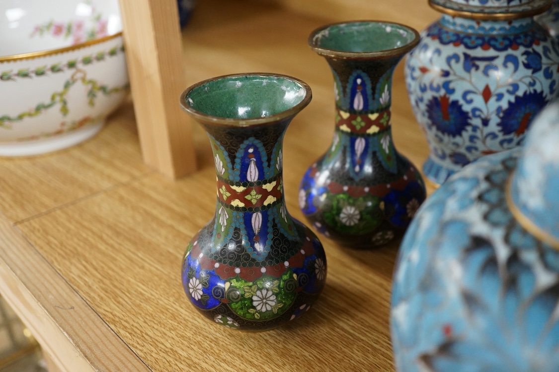 Thirteen various sized Chinese cloisonné enamel jars with covers and similar vases, tallest vase 31cm high.